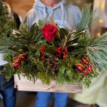 greenery and red floral centerpiece